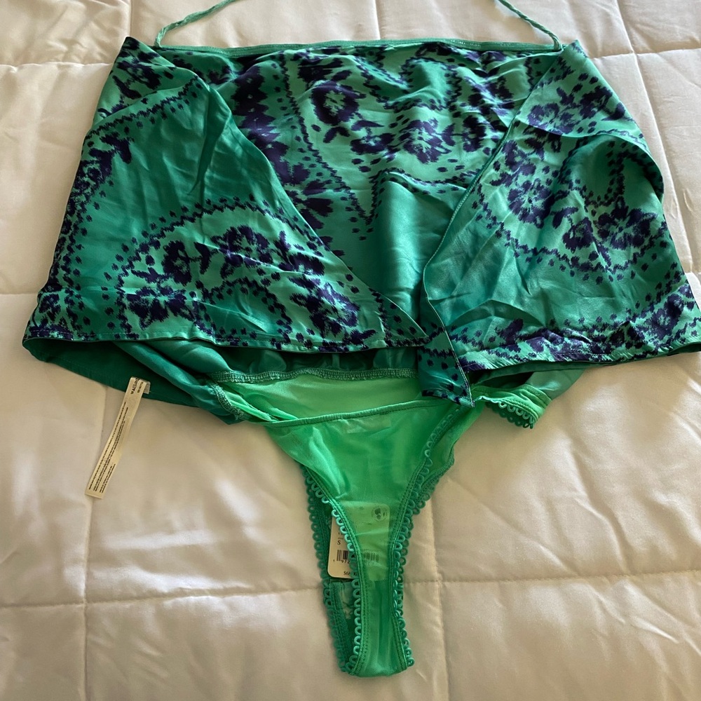 Free People BRAND NEW Bandanna style bodysuit. Size small.